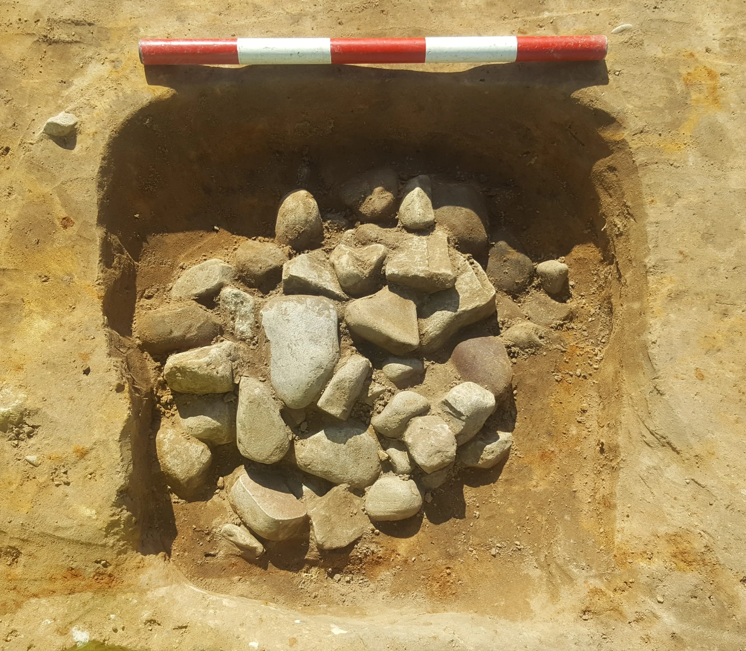 Hearth with fire-cracked stones.